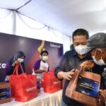 Telkomsel Siaga #SambungkanSenyuman Beri Bantuan ke Warga di 4 Kota